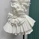 Skincare top design, niche female heavy worker, pleated three-dimensional flower slimming, irregular lotus leaf arrangement, vacation shirt trend