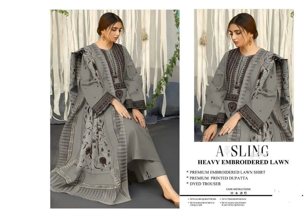 Elegant grey lawn suit featuring  intricate embroidery throughout